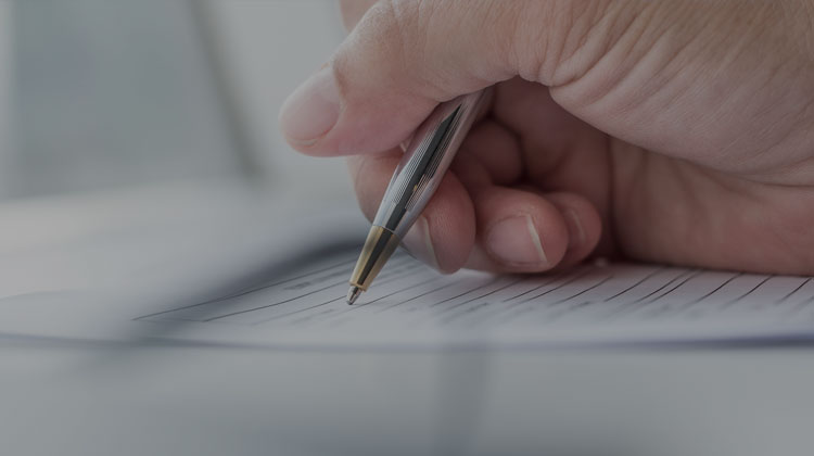 Signing Papers for Property Management in Houston